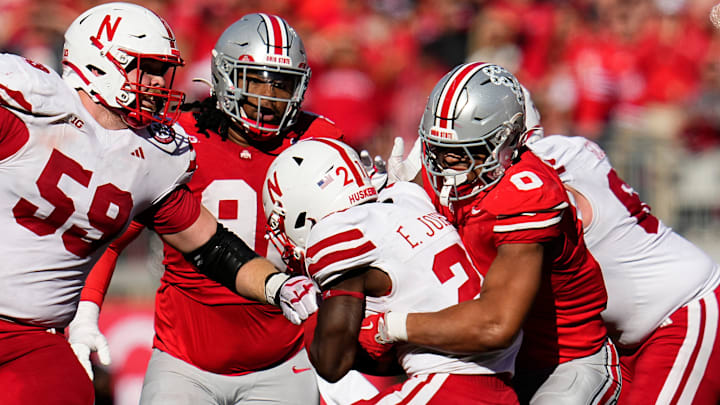 Ohio State Buckeyes linebacker Cody Simon (0) tackles Nebraska Cornhuskers running back Emmett Johnson (21) during the second half of the NCAA football game at Ohio Stadium in Columbus on Saturday, Oct. 26, 2024. Ohio State won 21-17. Ohio State Buckeyes linebacker Cody Simon (0) tackles Nebraska Cornhuskers running back Emmett Johnson (21) during the second half of the NCAA football game at Ohio Stadium in Columbus on Saturday, Oct. 26, 2024. Ohio State won 21-17.
