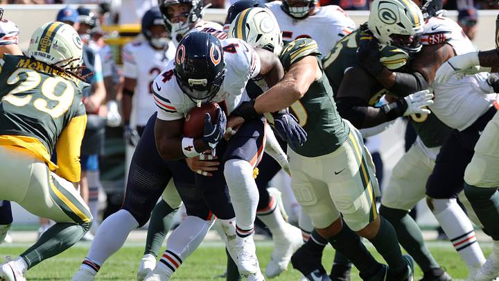 D'Andre Swift is wrapped up by the Packers Sunday as the Bears' running game went nowhere. D'Andre Swift is wrapped up by the Packers Sunday as the Bears' running game went nowhere.