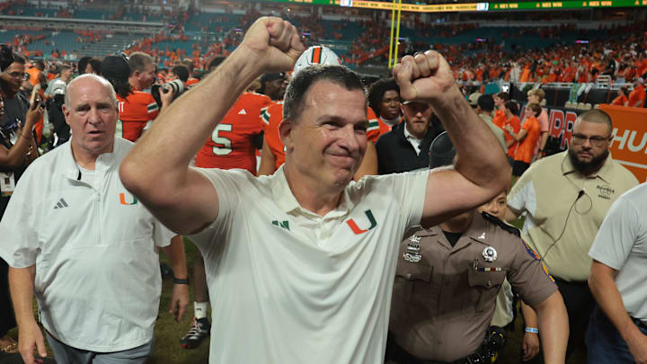 Aug 31, 2025; Miami Gardens, Florida, USA; Miami Hurricanes head coach Mario Cristobal reacts after defeating the Notre Dame Fighting Irish at Hard Rock Stadium. Mandatory Credit: Sam Navarro-Imagn Images