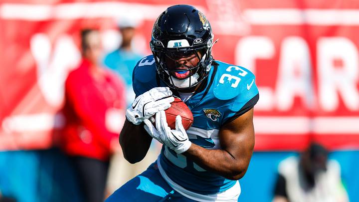 Jacksonville Jaguars running back Bhayshul Tuten (33) returns a kickoff during the first quarter in an NFL football AFC Wild Card playoff matchup.