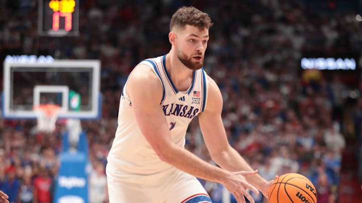 Kansas Jayhawks center Hunter Dickinson (1) passes the ball in the first half of the game against North Carolina Tar Heels inside Allen Fieldhouse Friday, Nov. 8, 2024.