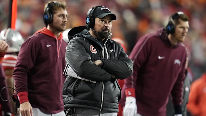 Dec 21, 2024; Columbus, Ohio, USA; Ohio State Buckeyes head coach Ryan Day watches from the sideline during the first half of a College Football Playoff first round game against the Tennessee Volunteers at Ohio Stadium.