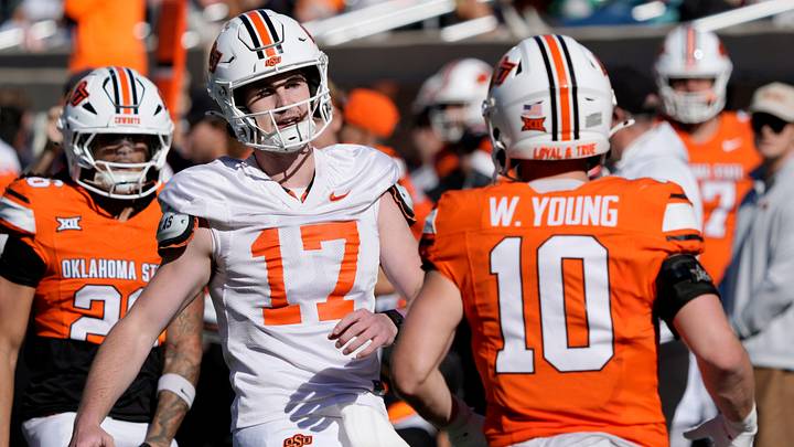 Oklahoma State's Drew Mestemaker celebrates with Oklahoma State's Wyatt Young after a touchdown during a spring football game.