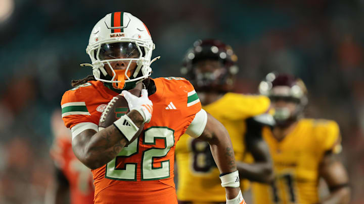 Sep 6, 2025; Miami Gardens, Florida, USA; Miami Hurricanes running back Girard Pringle Jr. (22) runs with the football for a touchdown against the Bethune-Cookman Wildcats during the fourth quarter at Hard Rock Stadium. Mandatory Credit: Sam Navarro-Imagn Images Sep 6, 2025; Miami Gardens, Florida, USA; Miami Hurricanes running back Girard Pringle Jr. (22) runs with the football for a touchdown against the Bethune-Cookman Wildcats during the fourth quarter at Hard Rock Stadium. Mandatory Credit: Sam Navarro-Imagn Images