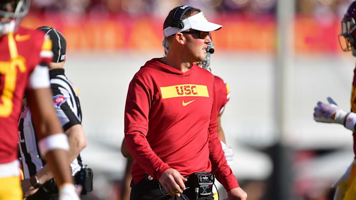Nov 16, 2024; Los Angeles, California, USA; Southern California Trojans head coach Lincoln Riley watches game action against the Nebraska Cornhuskers during the first half at the Los Angeles Memorial Coliseum. Mandatory Credit: Gary A. Vasquez-Imagn Images Nov 16, 2024; Los Angeles, California, USA; Southern California Trojans head coach Lincoln Riley watches game action against the Nebraska Cornhuskers during the first half at the Los Angeles Memorial Coliseum. Mandatory Credit: Gary A. Vasquez-Imagn Images