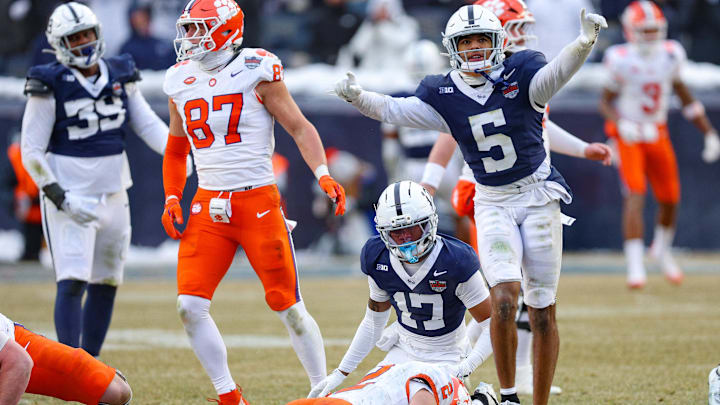 Penn State Nittany Lions cornerback Daryus Dixson (5) celebrates after a defensive stop against Clemson Tigers quarterback Cade Klubnik (2) during the second half of the 2025 Pinstripe Bowl at Yankee Stadium. 