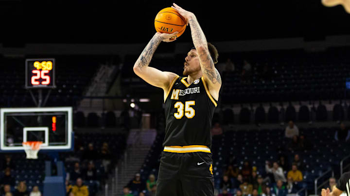 Dec 2, 2025; South Bend, Indiana, USA; Missouri Tigers guard Jacob Crews (35) shoots against the Notre Dame Fighting Irish during the second half at Purcell Pavilion at the Joyce Center. Mandatory Credit: Michael Caterina-Imagn Images Dec 2, 2025; South Bend, Indiana, USA; Missouri Tigers guard Jacob Crews (35) shoots against the Notre Dame Fighting Irish during the second half at Purcell Pavilion at the Joyce Center. Mandatory Credit: Michael Caterina-Imagn Images