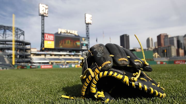 Baseball gloves sit on the field before the Pittsburgh Pirates host the Detroit Tigers in an inter-league game at PNC Park. 