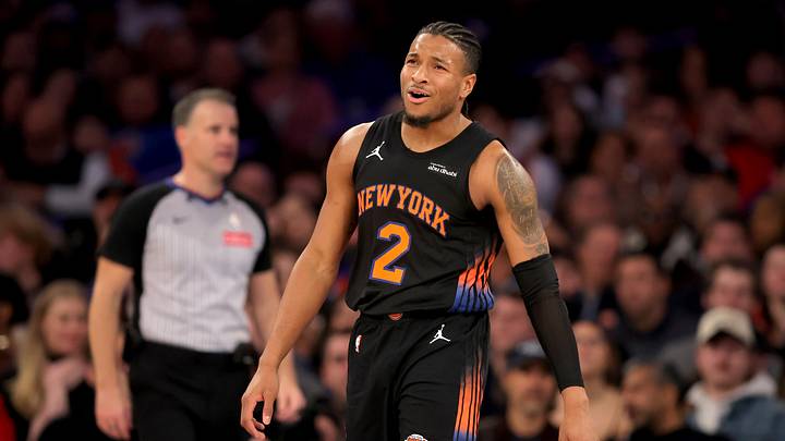 Knicks guard Miles McBride reacts during a game.