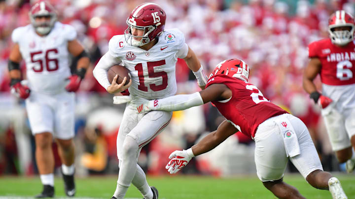 Jan 1, 2026; Pasadena, CA, USA; Alabama Crimson Tide quarterback Ty Simpson (15) runs against Indiana Hoosiers linebacker Rolijah Hardy (21) in the first half of the 2026 Rose Bowl and quarterfinal game of the College Football Playoff at Rose Bowl Stadium. Mandatory Credit: Gary A. Vasquez-Imagn Images Jan 1, 2026; Pasadena, CA, USA; Alabama Crimson Tide quarterback Ty Simpson (15) runs against Indiana Hoosiers linebacker Rolijah Hardy (21) in the first half of the 2026 Rose Bowl and quarterfinal game of the College Football Playoff at Rose Bowl Stadium. Mandatory Credit: Gary A. Vasquez-Imagn Images