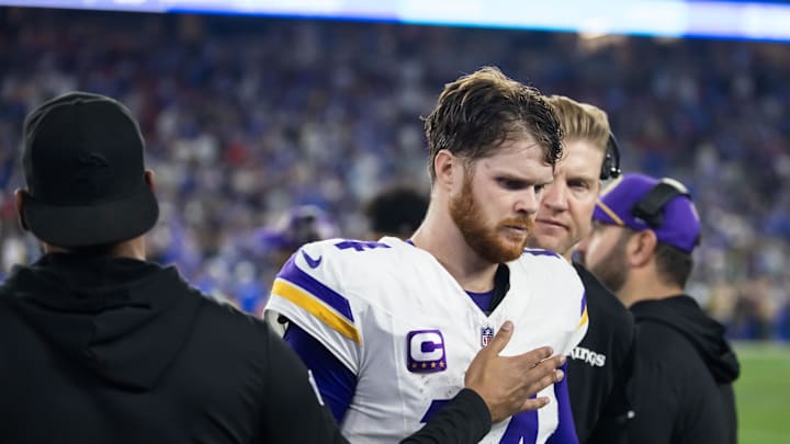 Jan 13, 2025; Glendale, AZ, USA; Minnesota Vikings quarterback Sam Darnold (14) reacts in the closing seconds of the game against the Los Angeles Rams during an NFC wild card game at State Farm Stadium. Mandatory Credit: Mark J. Rebilas-Imagn Images Jan 13, 2025; Glendale, AZ, USA; Minnesota Vikings quarterback Sam Darnold (14) reacts in the closing seconds of the game against the Los Angeles Rams during an NFC wild card game at State Farm Stadium. Mandatory Credit: Mark J. Rebilas-Imagn Images