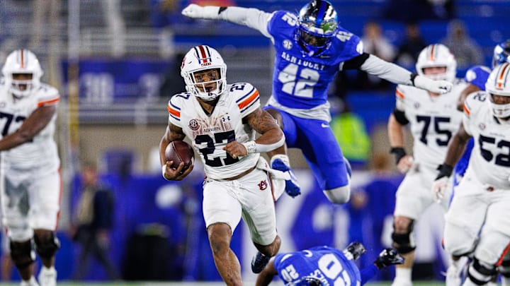 Oct 26, 2024; Lexington, Kentucky, USA; Auburn Tigers running back Jarquez Hunter (27) runs the ball during the fourth quarter against the Kentucky Wildcats at Kroger Field. Mandatory Credit: Jordan Prather-Imagn Images