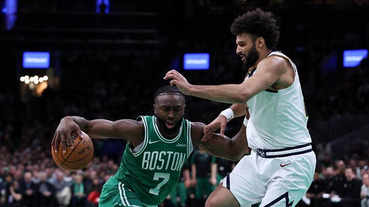 Mar 2, 2025; Boston, Massachusetts, USA; Boston Celtics forward Jaylen Brown (7) drives to the basket during the second half against the Denver Nuggets at TD Garden. Mandatory Credit: Paul Rutherford-Imagn Images