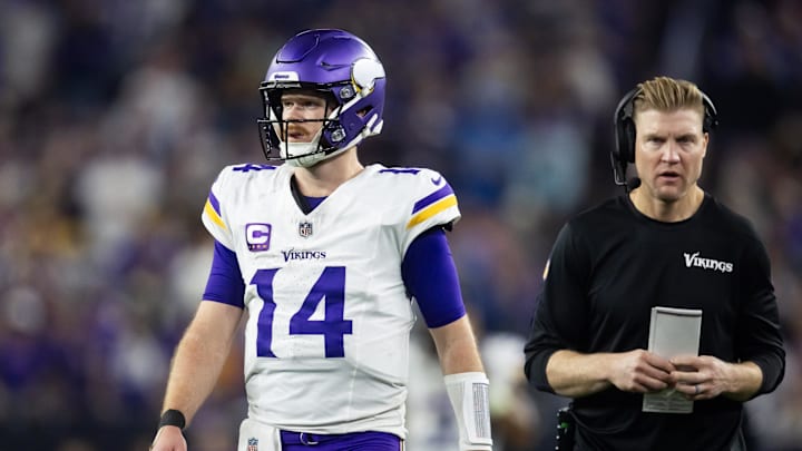 Jan 13, 2025; Glendale, AZ, USA; Minnesota Vikings quarterback Sam Darnold (14) with quarterbacks coach Josh McCown against the Los Angeles Rams during an NFC wild card game at State Farm Stadium. Mandatory Credit: Mark J. Rebilas-Imagn Images Jan 13, 2025; Glendale, AZ, USA; Minnesota Vikings quarterback Sam Darnold (14) with quarterbacks coach Josh McCown against the Los Angeles Rams during an NFC wild card game at State Farm Stadium. Mandatory Credit: Mark J. Rebilas-Imagn Images