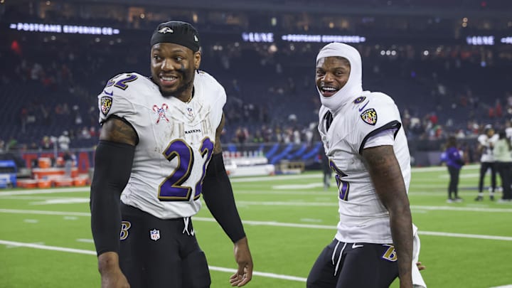 Dec 25, 2024; Houston, Texas, USA;  Baltimore Ravens running back Derrick Henry (22) and quarterback Lamar Jackson (8) smile after the game against the Houston Texans at NRG Stadium. Mandatory Credit: Troy Taormina-Imagn Images