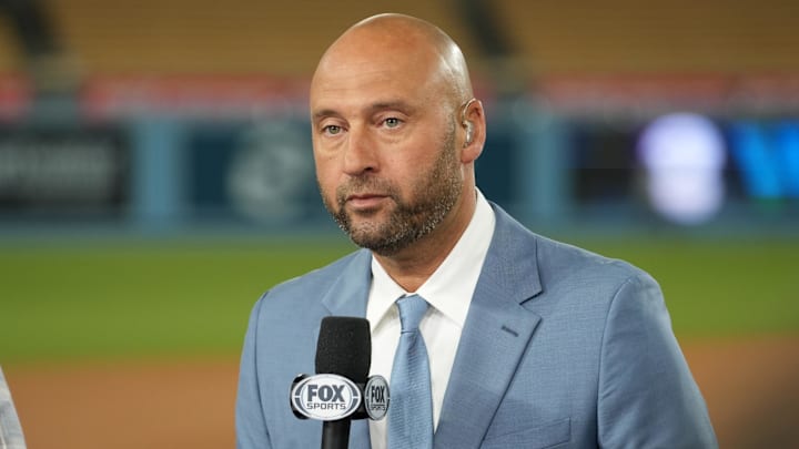 Oct 26, 2024; Los Angeles, California, USA; Fox Sports broadcaster Derek Jeter speaks on field after game two between the Los Angeles Dodgers and the New York Yankees in the 2024 MLB World Series at Dodger Stadium. Mandatory Credit: Kirby Lee-Imagn Images