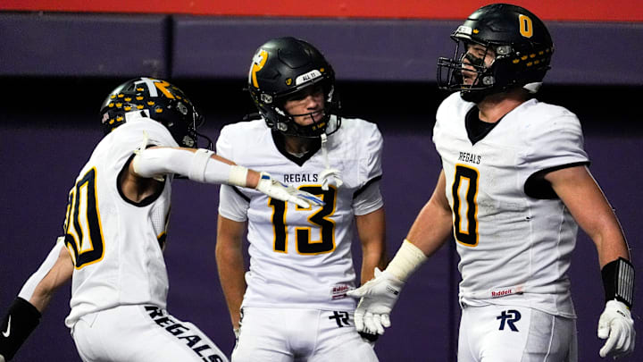 Iowa City Regina’s Tate Wallace.
