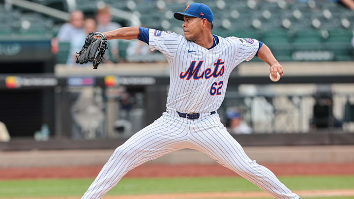 Jul 14, 2024; New York City, New York, USA; New York Mets starting pitcher Jose Quintana (62) delivers a pitch during the second inning against the Colorado Rockies at Citi Field. Mandatory Credit: Vincent Carchietta-Imagn Images
