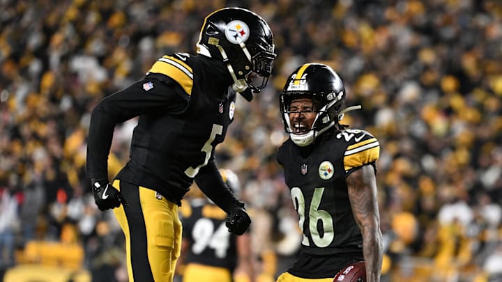 Jan 12, 2026; Pittsburgh, PA, USA; Pittsburgh Steelers cornerback Brandin Echols (26) and cornerback Jalen Ramsey (5) celebrate after a play during the second half of an AFC Wild Card Round game against the Houston Texans at Acrisure Stadium. Mandatory Credit: Barry Reeger-Imagn Images
