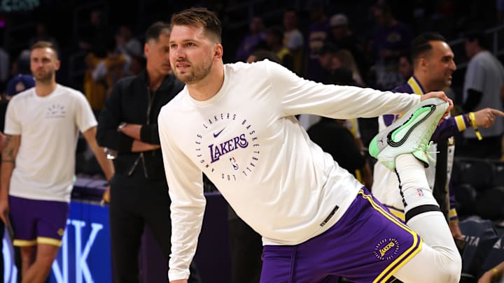 Feb 27, 2025; Los Angeles, California, USA; Los Angeles Lakers guard Luka Doncic (77) warms up before a game against the Minnesota Timberwolves at Crypto.com Arena. Mandatory Credit: Jason Parkhurst-Imagn Images