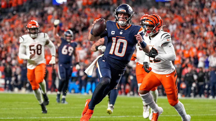 Denver Broncos quarterback Bo Nix (10) runs into the end zone for a touchdown in the first quarter of the NFL Week 4 Monday Night Football game between the Denver Broncos and the Cincinnati Bengals at Empower Field at Mile High in Denver on Monday, Sept. 29, 2025.