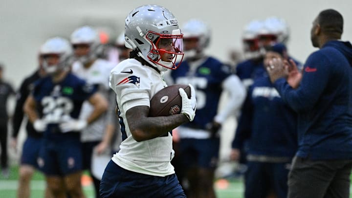 May 9, 2025; Foxborough, MA, USA; New England Patriots wide receiver Kyle Williams (18) runs with the ball during rookie camp at Gillette Stadium. Mandatory Credit: Eric Canha-Imagn Images