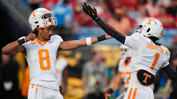 Tennessee quarterback Nico Iamaleava (8) and wide receiver Dont'e Thornton Jr. (1) i a pregame ritual before the start of the NCAA College football game against NC State on Saturday, Sept. 7, 2024 in Charlotte, NC.