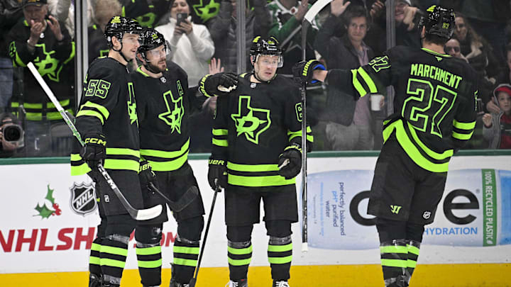 Nov 29, 2024; Dallas, Texas, USA; Dallas Stars defenseman Thomas Harley (55) and center Tyler Seguin (91) and right wing Evgenii Dadonov (63) and left wing Mason Marchment (27) celebrate a power play goal scored by Seguin against the Colorado Avalanche during the first period at the American Airlines Center. Mandatory Credit: Jerome Miron-Imagn Images