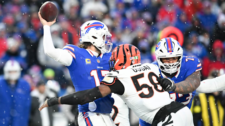 Dec 7, 2025; Orchard Park, New York, USA; Buffalo Bills quarterback Josh Allen (17) is pressured by Cincinnati Bengals defensive end Joseph Ossai (58) in the fourth quarter at Highmark Stadium. Mandatory Credit: Mark Konezny-Imagn Images
