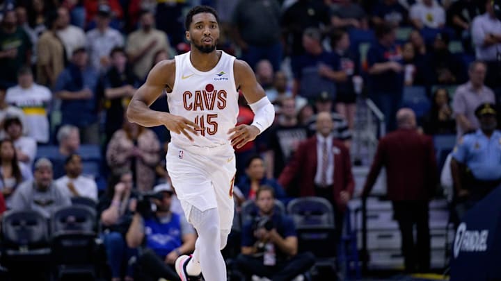 Nov 6, 2024; New Orleans, Louisiana, USA; Cleveland Cavaliers guard Donovan Mitchell (45) reacts after a three point basket during the first half against the New Orleans Pelicans at Smoothie King Center. Mandatory Credit: Matthew Hinton-Imagn Images