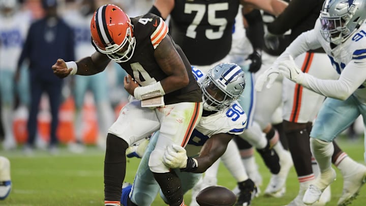 Dallas Cowboys defensive end DeMarcus Lawrence forces a fumble on Cleveland Browns quarterback Deshaun Watson during the second half at Huntington Bank Field. 
