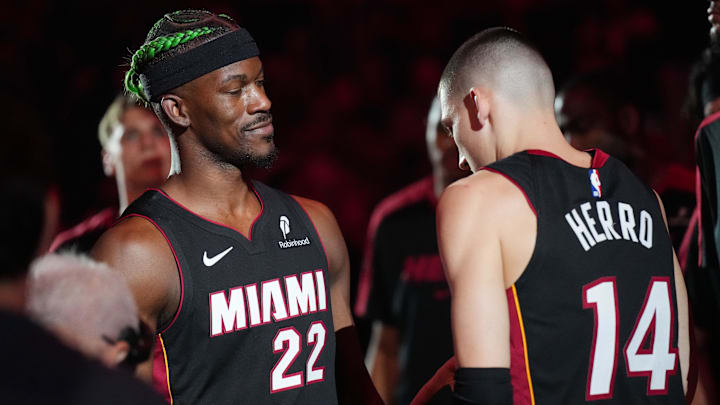 Jan 2, 2025; Miami, Florida, USA; Miami Heat forward Jimmy Butler (22) and guard Tyler Herro (14) are introduced during pregame ceremonies before the game against the Indiana Pacers at Kaseya Center. Mandatory Credit: Jim Rassol-Imagn Images Jan 2, 2025; Miami, Florida, USA; Miami Heat forward Jimmy Butler (22) and guard Tyler Herro (14) are introduced during pregame ceremonies before the game against the Indiana Pacers at Kaseya Center. Mandatory Credit: Jim Rassol-Imagn Images