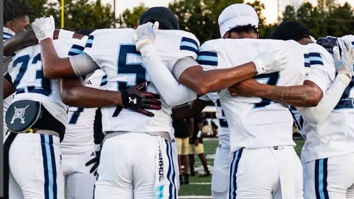 The Dorman football team huddle up prior to game. The Dorman football team huddle up prior to game.