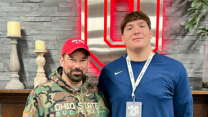 Sam Greer poses with Ohio State coach Ryan Day
