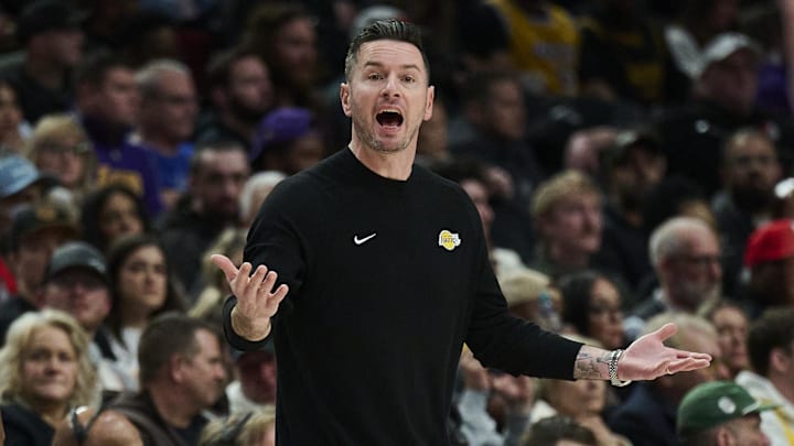 Los Angeles Lakers head coach JJ Redick calls out to players during the second half against the Portland Trail Blazers.