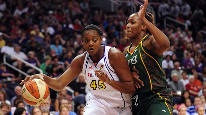 Aug 20, 2010; Phoenix, AZ, USA; Phoenix Mercury forward Kara Braxton (left) drives the ball against Seattle Storm forward Le'coe Willingham during the first half at US Airways Center. Mandatory Credit: Jennifer Stewart-Imagn Images Aug 20, 2010; Phoenix, AZ, USA; Phoenix Mercury forward Kara Braxton (left) drives the ball against Seattle Storm forward Le'coe Willingham during the first half at US Airways Center. Mandatory Credit: Jennifer Stewart-Imagn Images
