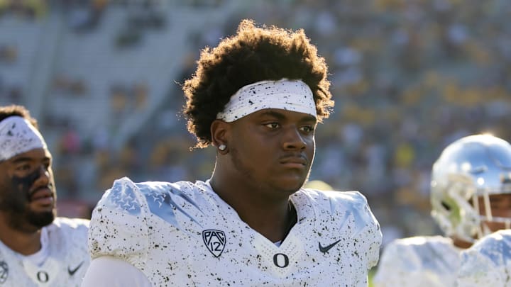Oregon Ducks defensive lineman A'Mauri Washington (58)