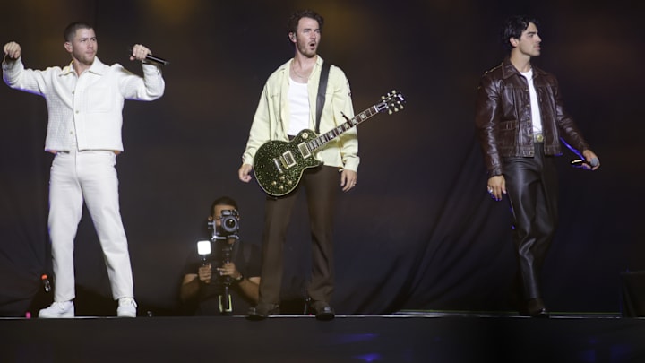 (L-R) Nick Jonas, Kevin Jonas and Joe Jonas members of the...