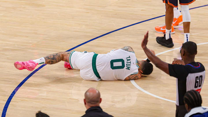 Boston Celtics forward Jayson Tatum was down on the court in pain after rupturing his right Achilles tendon during Game 4 of the Eastern Conference semifinals against the New York Knicks.
