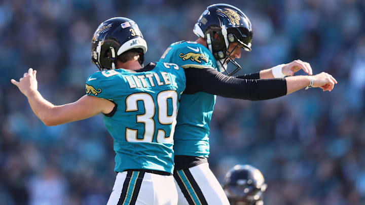 Jacksonville Jaguars placekicker Cam Little (39) celebrates with punter Logan Cooke (9) after kicking a sixty-seven yard field goal against the Tennessee Titans during the second quarter at EverBank Stadium.