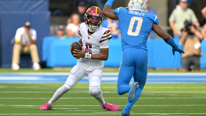 Washington Commanders quarterback Jayden Daniels wears custom Nike Kobe 6 cleats.