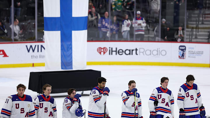 Jan 2, 2026; St. Paul, Minnesota, UNITED STATES; United States players react to their teams overtime loss against Finland in the quarterfinals of the 2026 IIHF World Junior Championship at Grand Casino Arena. Mandatory Credit: Matt Krohn-Imagn Images