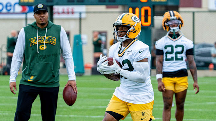 Green Bay Packers running back MarShawn Lloyd (32) catches the ball during the second day of training camp on Thursday, July 24, 2025, at Ray Nitschke Field in Ashwaubenon, Wis.