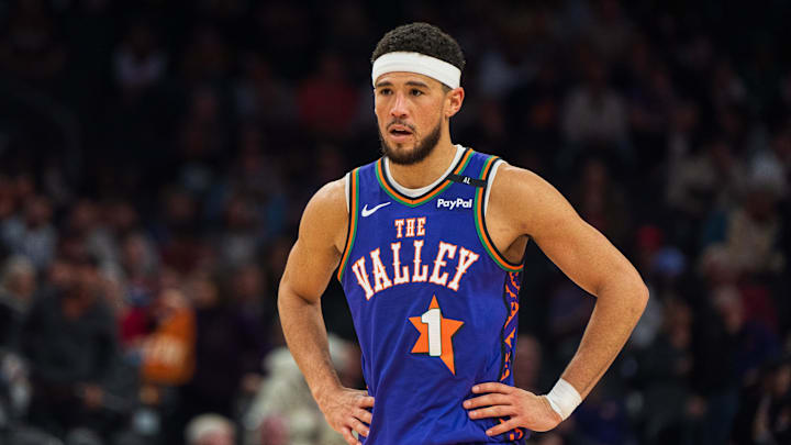 Dec 15, 2024; Phoenix, Arizona, USA; Phoenix Suns guard Devin Booker (1) reacts between plays in the second half during a game against the Portland Trail Blazers at Footprint Center. Mandatory Credit: Allan Henry-Imagn Images