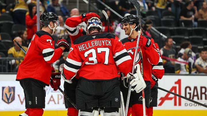 Oct 30, 2026; Las Vegas, Nevada, USA;  New Jersey Devils goaltender Connor Hellebuyck (37) is congratulated after defeating the Vegas Golden Knights at T-Mobile Arena.  Mandatory Credit: Christopher Trim-Imagn Images