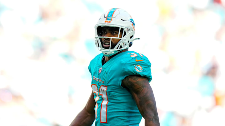 Jan 8, 2023; Miami Gardens, Florida, USA; Miami Dolphins running back Raheem Mostert (31) celebrates after gaining yardage against the New York Jets during the second half at Hard Rock Stadium. Mandatory Credit: Rich Storry-Imagn Images