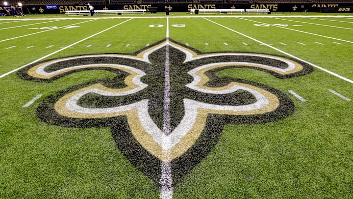 Oct 30, 2022; New Orleans, Louisiana, USA;  General view of the New Orleans Saints logo as the midfield logo fleur-de-lis after the game between the New Orleans Saints and the Las Vegas Raiders at Caesars Superdome. Mandatory Credit: Stephen Lew-Imagn Images
