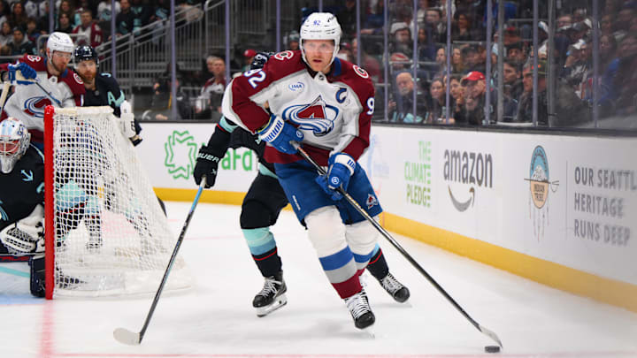 Dec 16, 2025; Seattle, Washington, USA; Colorado Avalanche left wing Gabriel Landeskog (92) plays the puck during the third period against the Seattle Kraken at Climate Pledge Arena. Mandatory Credit: Steven Bisig-Imagn Images Dec 16, 2025; Seattle, Washington, USA; Colorado Avalanche left wing Gabriel Landeskog (92) plays the puck during the third period against the Seattle Kraken at Climate Pledge Arena. Mandatory Credit: Steven Bisig-Imagn Images
