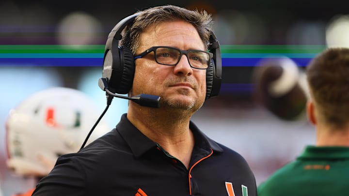 Sep 7, 2024; Miami Gardens, Florida, USA; Miami Hurricanes offensive coordinator Shannon Dawson looks on from the sideline against the Florida A&M Rattlers during the first quarter at Hard Rock Stadium. Mandatory Credit: Sam Navarro-Imagn Images