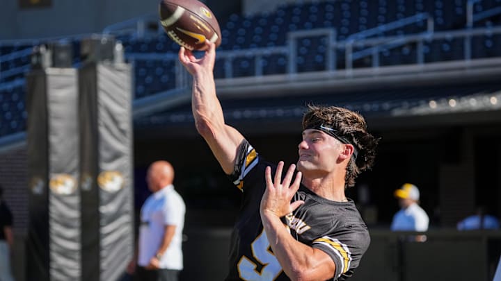 Aug 28, 2025; Columbia, Missouri, USA; Missouri Tigers quarterback Beau Pribula (9) warms up against the Central Arkansas Bears prior to a game at Faurot Field at Memorial Stadium. Mandatory Credit: Denny Medley-Imagn Images